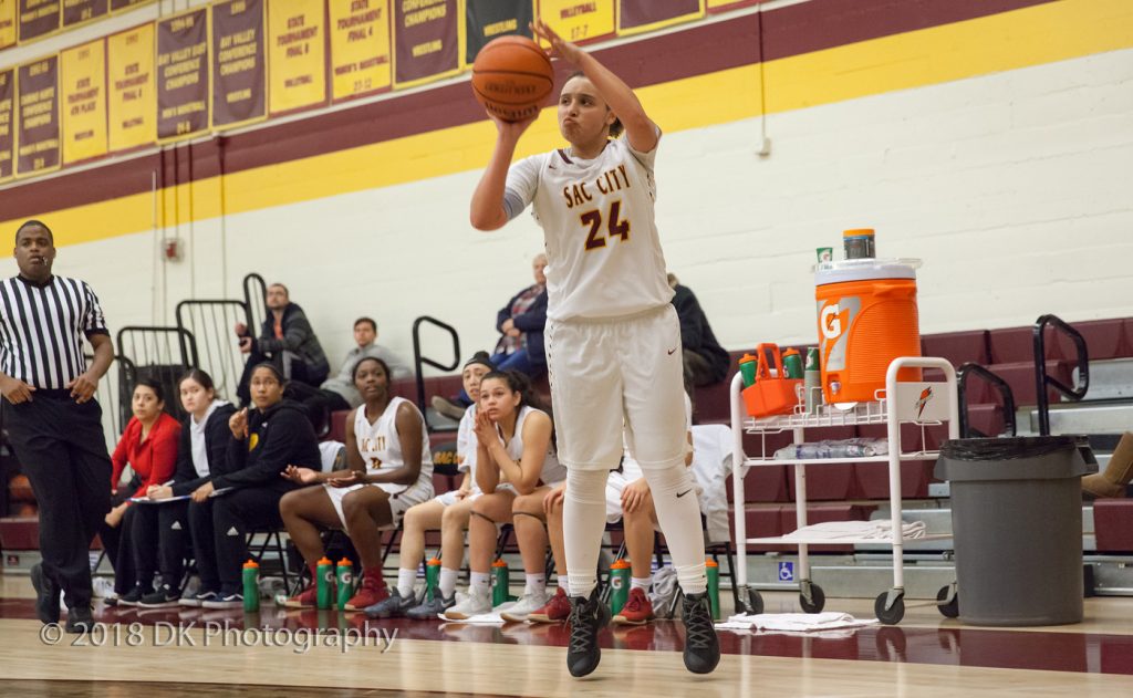 Freshman guard Dejanet Porter pulls up for a jumper at a recent home game for City College. Photo by Dianne Rose