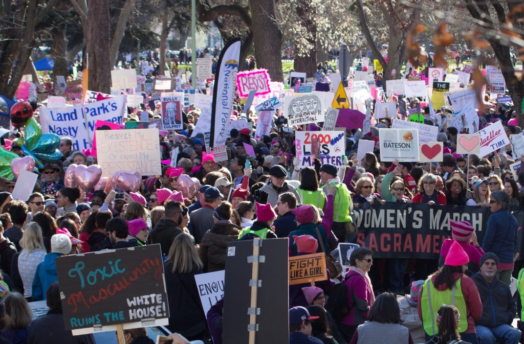 Volunteers+wearing+green+vests+do+their+best+to+keep+formation+as+demonstrators+march+on+the+Capitol+in+second+annual+Womens+March+Jan.+20+%7C+Photo+by+Bobby+Castagna+%7C+Photo+Editor+%7C+bcastagna.express%40gmail.com