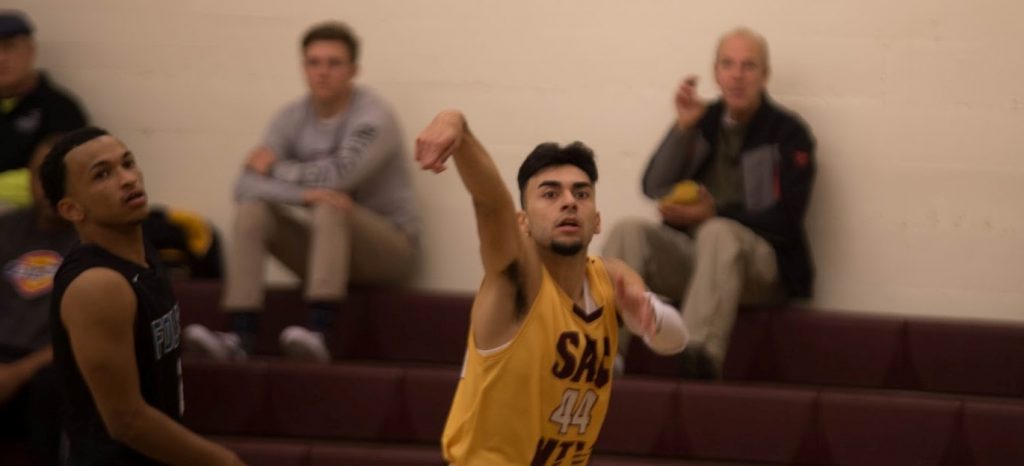 City College sophomore Gabe Serna drains a record-setting 3-pointer in the Panthers 92-65 victory Feb. 13 against Folsom Lake College. Serna is the new record holder for 3-pointers in a single season. | Photo by Jackson Durham jcmdurham.express@gmail.com