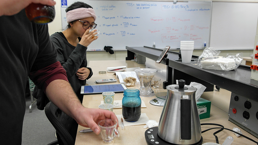 Biomedical+Engineering+major+Mari-Beth+Browne+and+her+lab+partner+examine+the+aroma+of+coffee+brewed+during+a+lab+exercise+March+2.+Browne+said+she+is+not+a+fan+of+the+taste+of+coffee%2C+however+she+enjoys+the+smell.+Nita+Gardipee+%7C+Staff+Photographer+%7C+ngardipee.express%40gmail.com