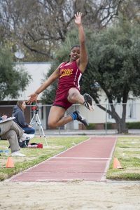 City freshman Aaliyah Saunders leaps for distance during the long jump March 10 at the UC Davis Aggie Open. Saunders placed 12th overall with a jump of 4.14 meters. | Photo by Jason Pierce | jpierce.express@gmail.com