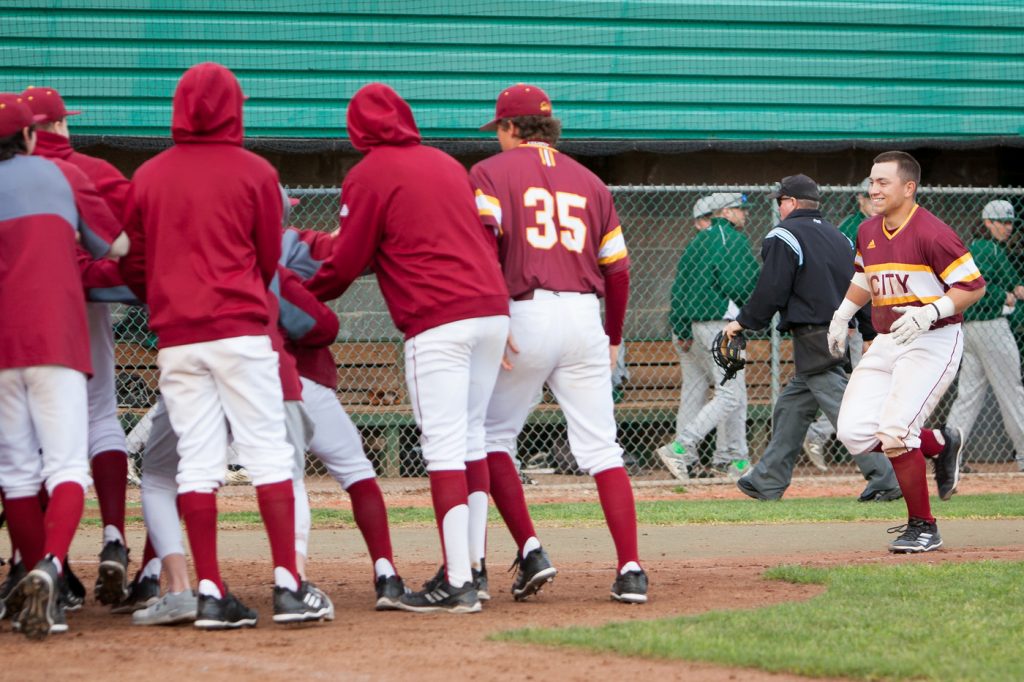 Kevin Saenz (far right) prepares to be mobbed by his teammates at home plate after hitting a walk-off 3-run homer at Union Stadium Saturday. The Panthers beat Diablo Valley College 5-2 in 10 innings. | Photo by Dianne Rose | dianne.rose.express@gmail.com