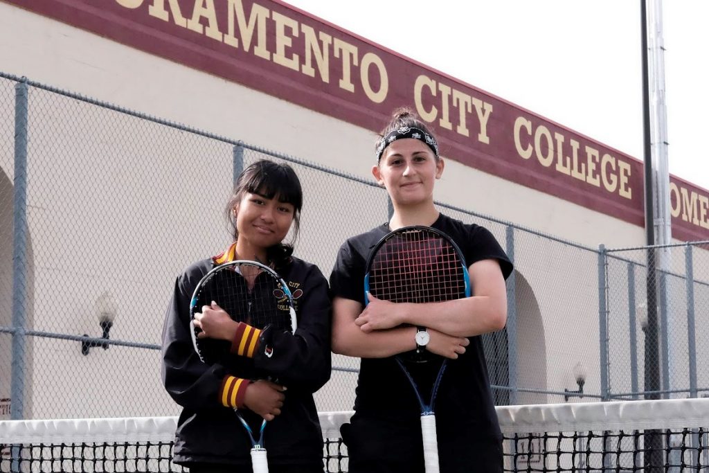 City college students Steffi Campos (left) and Denise Mosciatti take a pause from an April 18 practice at the City College tennis courts. Both of them have qualified for the state tournament beginning April 25. | Photo by Phoenix Kanada | pkanada.express@gmail.com