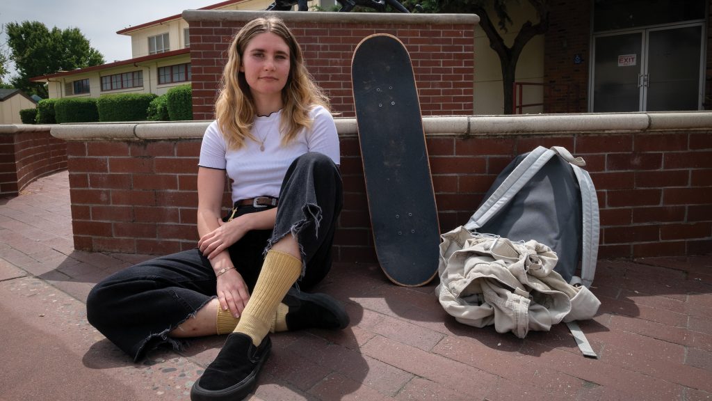 Jane Yakovlev with her skateboard. Photo by Jason Pierce | News Editor | jpierce.express@gmail.com