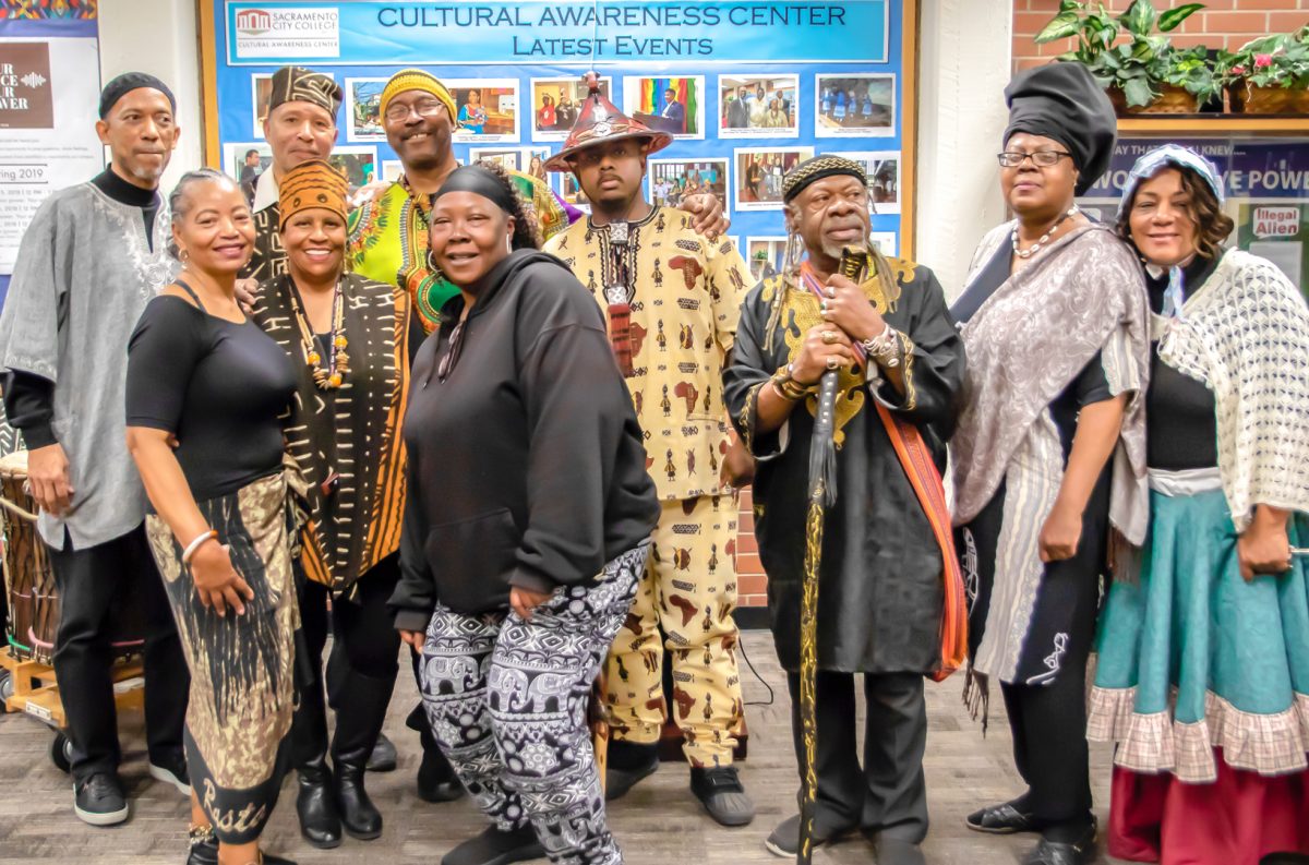 Members of “The Voices of Our Ancestors”, celebrate history and honor their ancestors through performing West African drumming, African dancing, personal historical poetry and spoken word in the Cultural Awareness Center.  Photo by Sara Nevis | Staff Photographer | snevis.express@gmail.com 