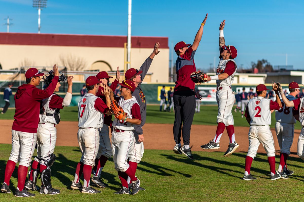 SCC Panthers Baseball Players and Coaches celebrate after their victory against ARC | City College Campus | Sacramento, CA  | Thursday 03-14-2019 | Photo by Niko Panagopoulos | Staff Photographer | npanagopoulos.express@gmail.com