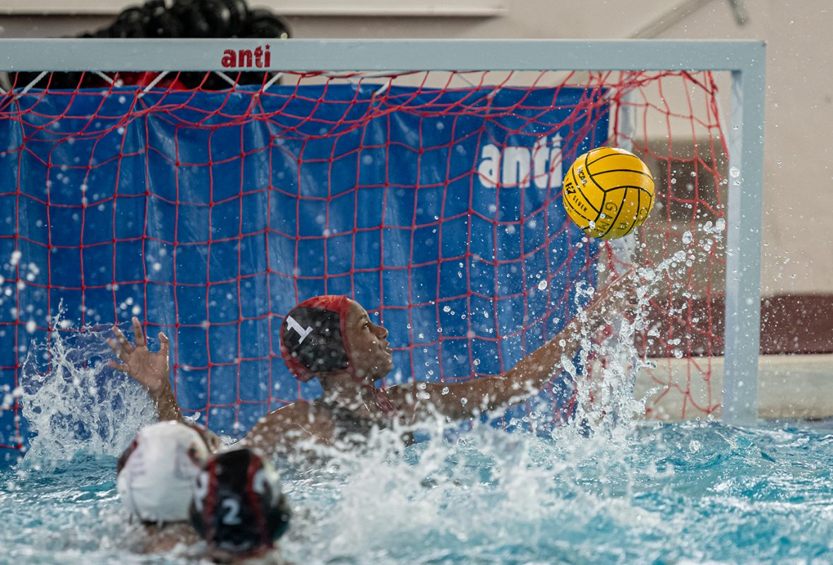 Panthers Goalie #1 Martha Shrader blocking a goal attempt by Rams #8 Raylene McVicar | Hoos Pool | Sacramento, Calif. | Wednesday 09-18-2019 | Rams beat Panthers 8-6 | Photo by Niko Panagopoulos | Staff Photographer | npanagopoulos.express@gmail.com