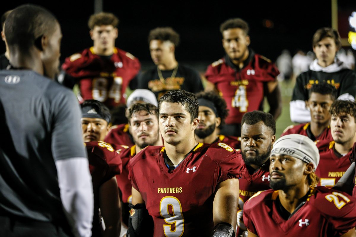 Head Coach Danny Walker talks with the team after the win against Diablo Valley College at Hughes Stadium Saturday, Sept. 21, 2019. City College won 13 -10. (Photo by Jerome Jeffries | jerome1027@msn.com)