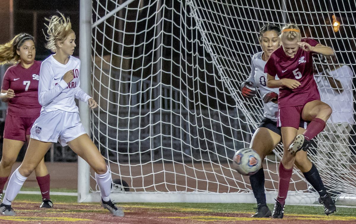 City College Olivia Foulk (5) saves a potential goal from a corner kick in the second half in the game against Sierra College at Hughes Stadium Thursday, Sept. 26, 2019. Sierra College beat City College 5-0. (Photo by Sara Nevis|Photo Editor|snevis.express@gmail.com)