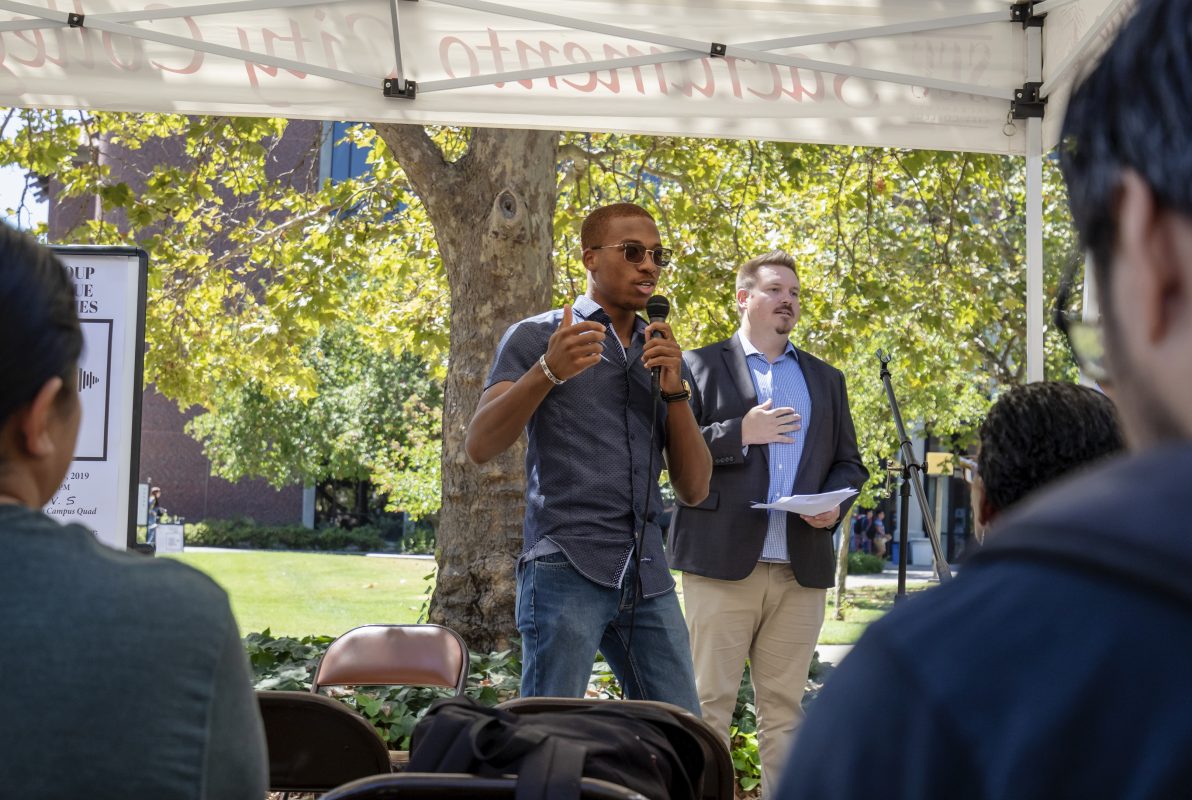 Sheku Baryoh, student senate vice president and political science major, addressing the students and faculty at the “Your Voice, Your Power: Creating Community” discussion in the Student Quad on Tuesday, September 3, 2019. Photo by Sara Nevis | Photo Editor | snevis.express@gmail.com