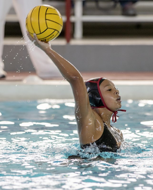 City College Brooke Bowen-Seay (12) passes the ball forward to a teammate during the first quarter in the match against Diablo Valley College at Hoos Pool at City College Wednesday, Oct. 2, 2019. DVC beat City College 18-3. (Photo by Sara Nevis/Photo Editor/snevis.express@gmail.com)