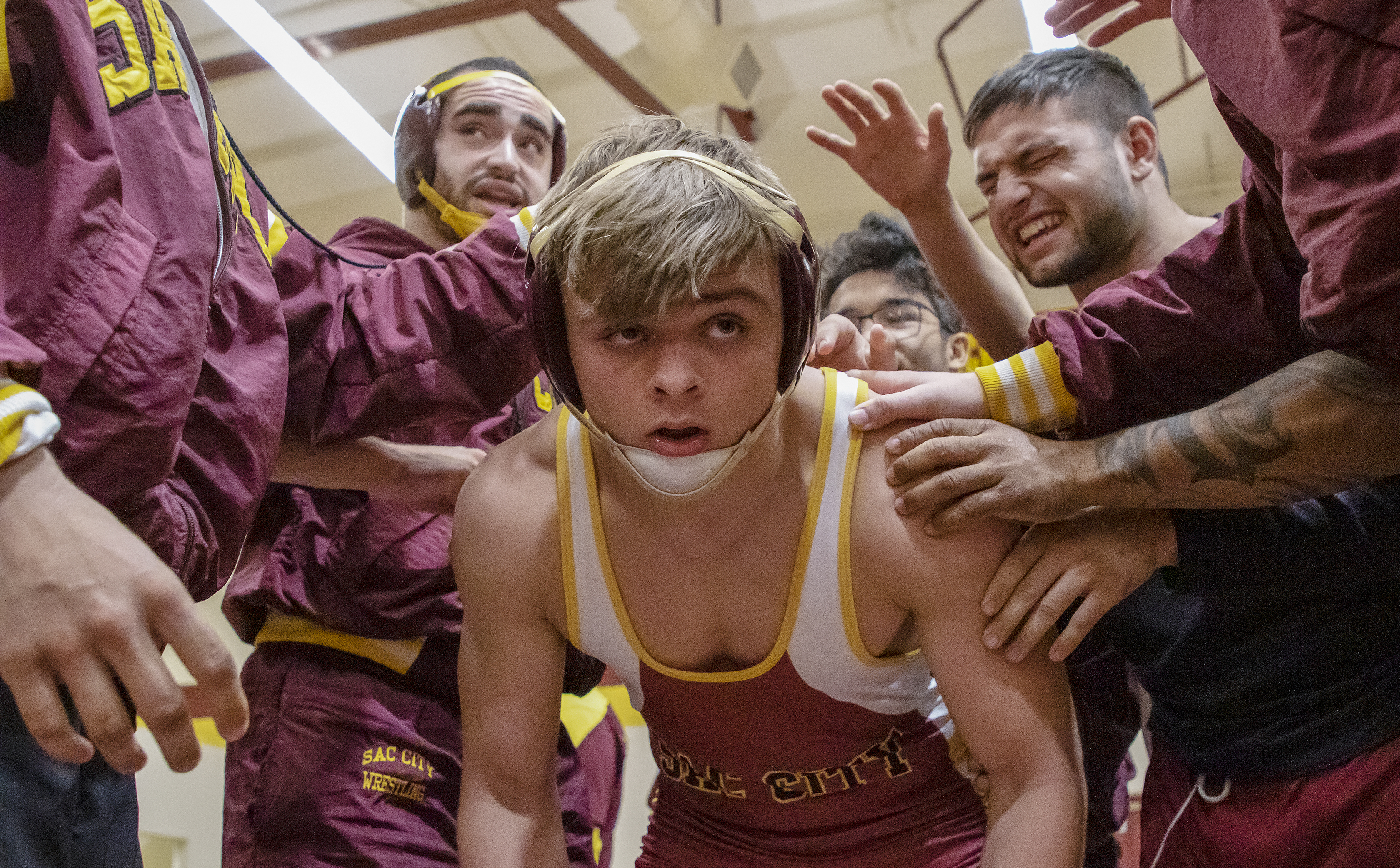 City+College+Liam+Leckie%2C+174-pound+weight%2C+in+the+huddle+before+his+match+against+Lassen+Community+College+Tyler+Moore+in+the+North+Gym+at+City+College+Wednesday%2C+Oct.+9%2C+2019.+Leckie+wins+by+pin+in+3%3A10.+City+College+beat+Lassen+College+29%E2%80%9313.+%28Sara+Nevis%2Fsnevis.express%40gmail.com%29