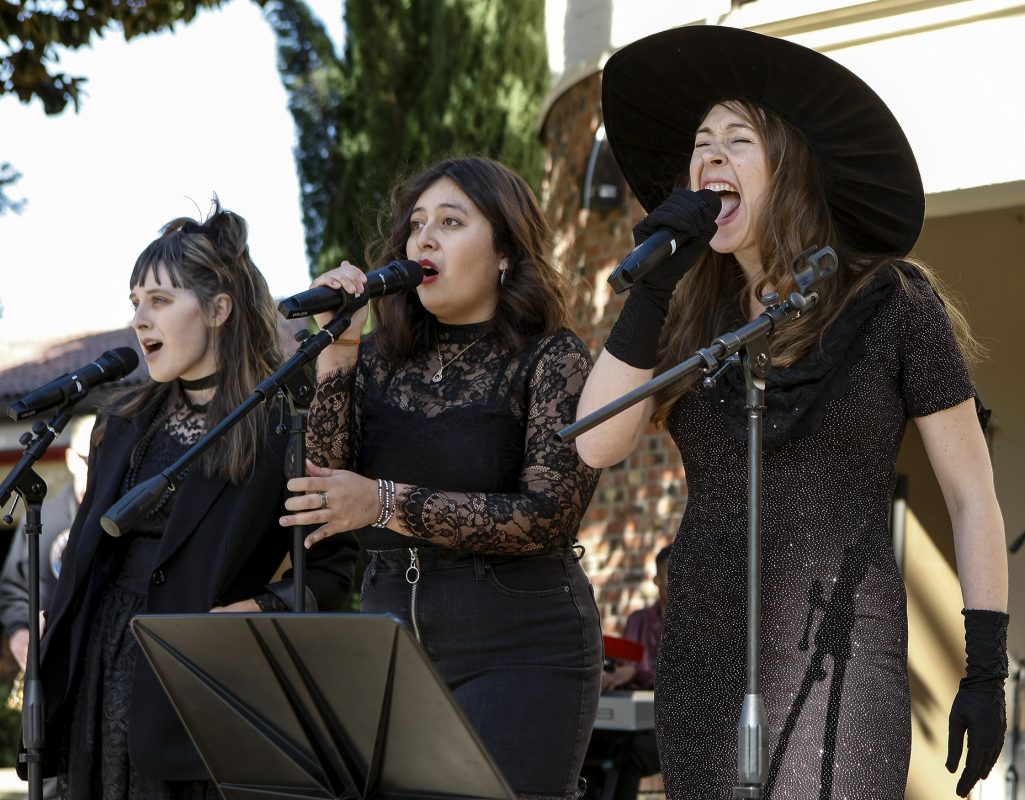 City College Commercial Music Ensemble members (left to right) Gillian Rains, psychology major; Hannah Miller, music and communications major; and Tara Stice, music and business management major, deliver soaring vocals during the Halloween concert in the quad at City College Thursday, Oct. 31, 2019. (Jerome Jeffries/jerome1027@msn.com)