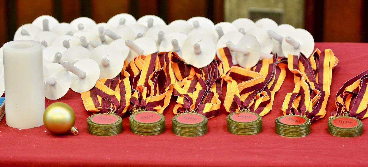 Medallions and candles for the 30 new inductees at the induction ceremony of Phi Theta Kappa Beta Eta Psi chapter held in the Student Center at City College Saturday, Dec. 7, 2019. (Ken Byes/kenbyesphotography@gmail.com)