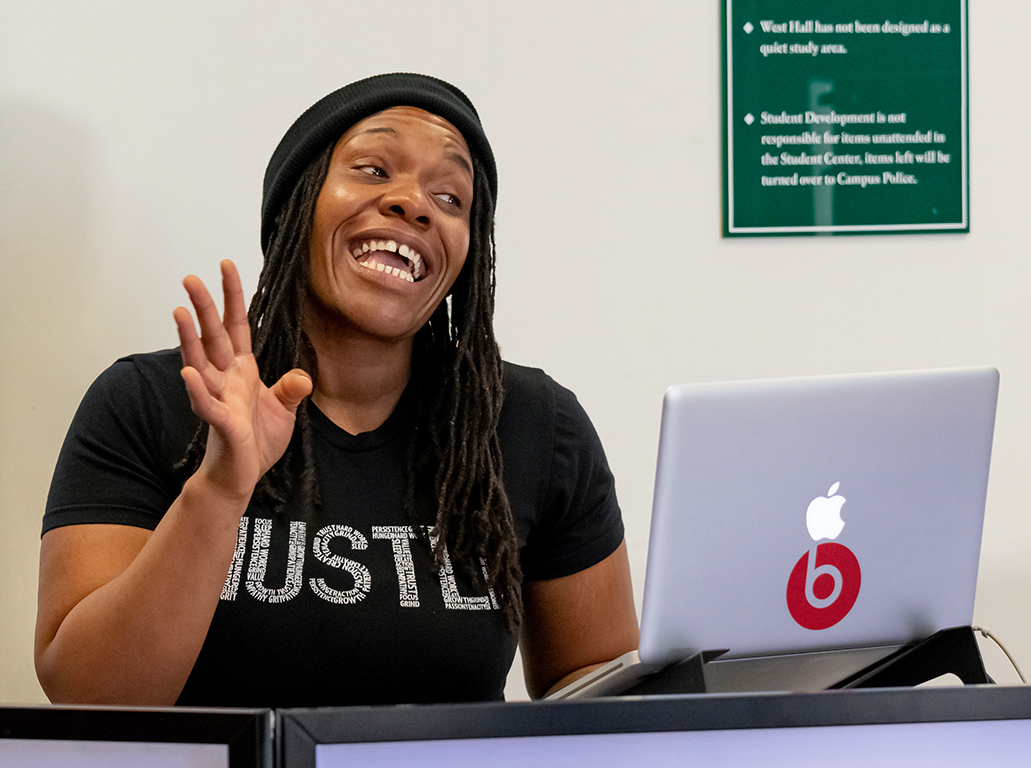 Sherice Carter, D.J. Remme, grooving to her live mix during the Welcome Black event hosted by the Ashe Center in the Student Center at City College Wednesday, Feb. 5, 2020. (Niko Panagopoulos/npanagopoulos.express@gmail.com)
