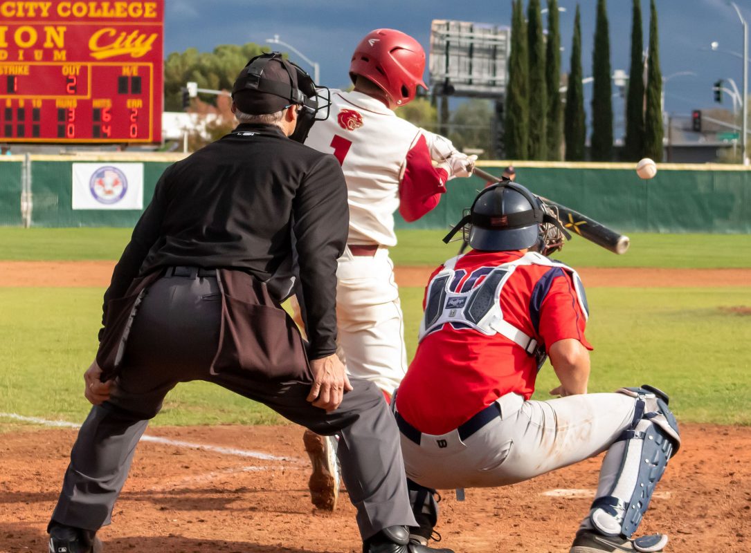 Joey Daini (1) hits a three RBI home run to left field in the bottom of the sixth inning against Santa Rosa Junior College at Union Stadium Tuesday, March 7, 2020. Daini has two hits in four at bat with 3 RBIs. Santa Rosa defeated City College College 5-4. (James Fife/jfife.express@gmail.com)