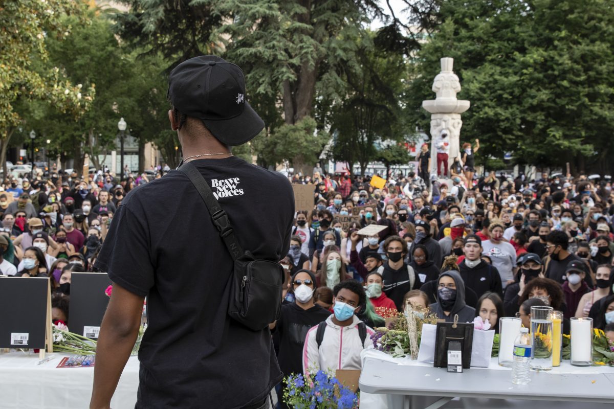 Demonstrators at Cesar E. Chavez Plaza listen to speakers during the protest over the death of George Floyd in Sacramento, California, Sunday, May 31, 2020. George Floyd died in Minneapolis Monday, May 25, after being detained by police. (Sara Nevis/snevis.express@gmail.com)