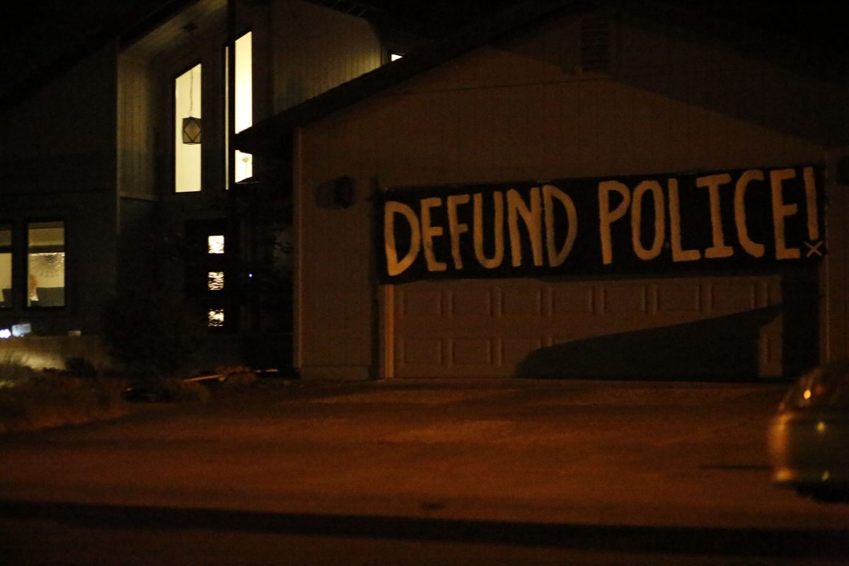 The banner displayed across Mayor Steinberg's garage door at the block party organized by Defund the Police Sacramento that started at Mayor Darrell Steinberg’s house and ended at Frank Seymour Park in Sacramento, California, Saturday, June 20, 2020. Music played and there were performers for almost a hundred people in the park after a 