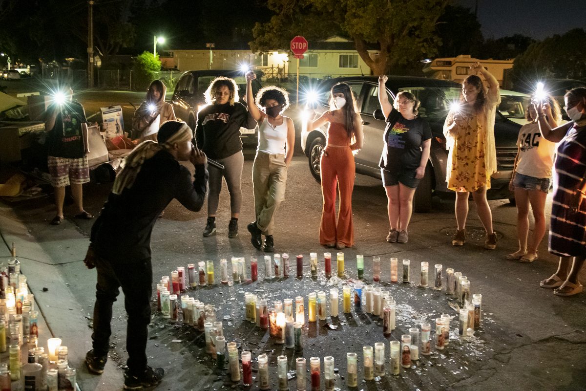 Stevante Clark speaks to the group at Joseph Almanza's, known as Jojo, memorial site during the “Stephon Clark Sunday” organized by Stevante Clark, brother of Stephon Clark, former City College student who was fatally shot by Sacramento police March 18, 2018, which started at Clark’s grandmother’s house then to two memorials in the neighborhood in Sacramento, California, Sunday, June 21, 2020. (Sara Nevis/snevis.express@gmail.com)
