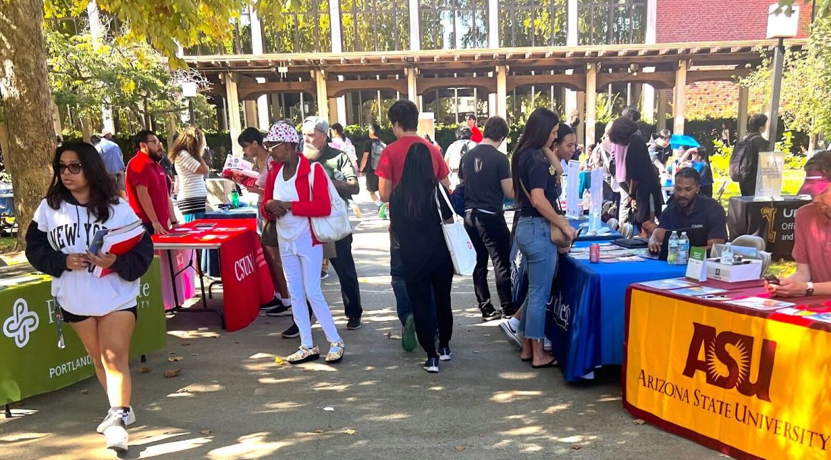 Photo of the day: Students roam through college and university booths during Transfer Day