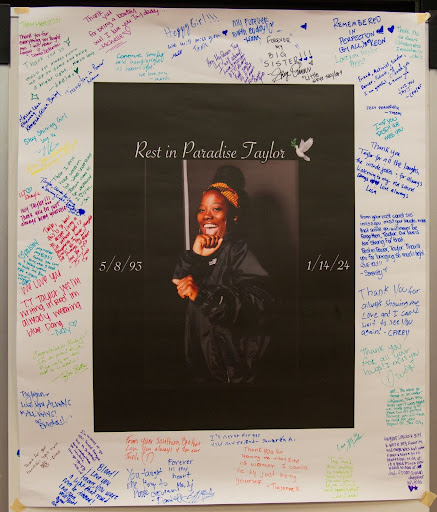 Attendees write notes on a picture of Taylor McClure for her family during the celebration of life event held in the ASHÉ Center, located in the student center at City College Saturday, Feb. 3 2024.