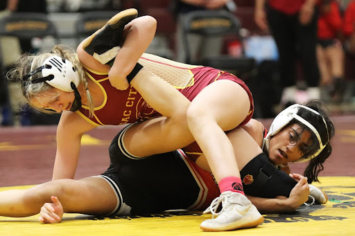 Alexis Hazelton, wrestling her opponent, Araceli Stanev of Bakersfield College at the 2024 3C2A State Championship tournament on Saturday April 20, 2024.