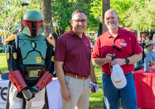 Makerspace Laboratory Technician Christian Espinoza, dressed as Star Wars character Boba Fett, City College President Albert Garcia and Mechanical-Electrical Technology Professor Richard Gentry attends the Celebrate City event at City College Friday, April 19, 2024.