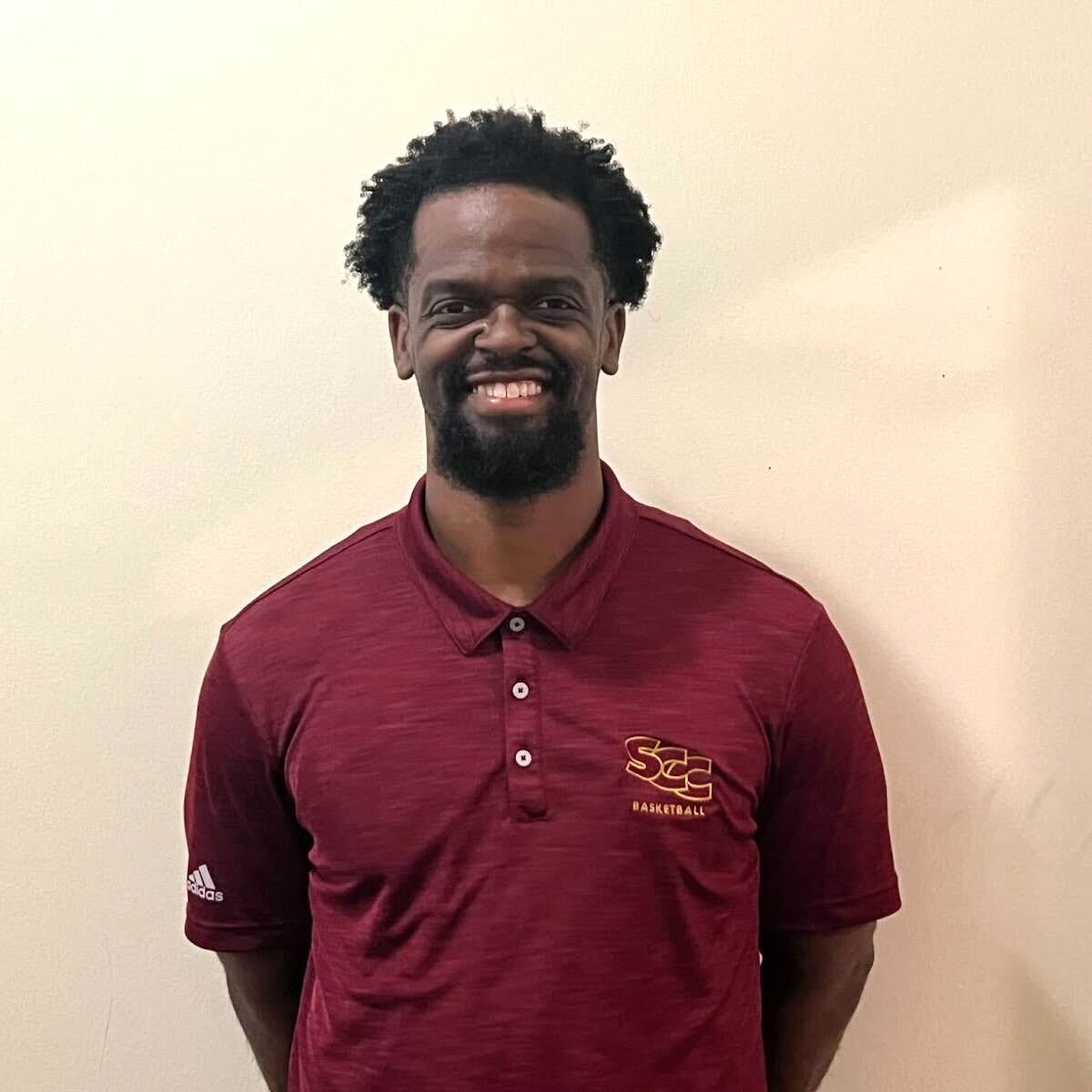 Caleb Theodore, the new head coach of the Sacramento City College Panthers women’s basketball team, poses in the North Gym of City College on Thursday, Sept. 26, 2024, in Sacramento, Calif.