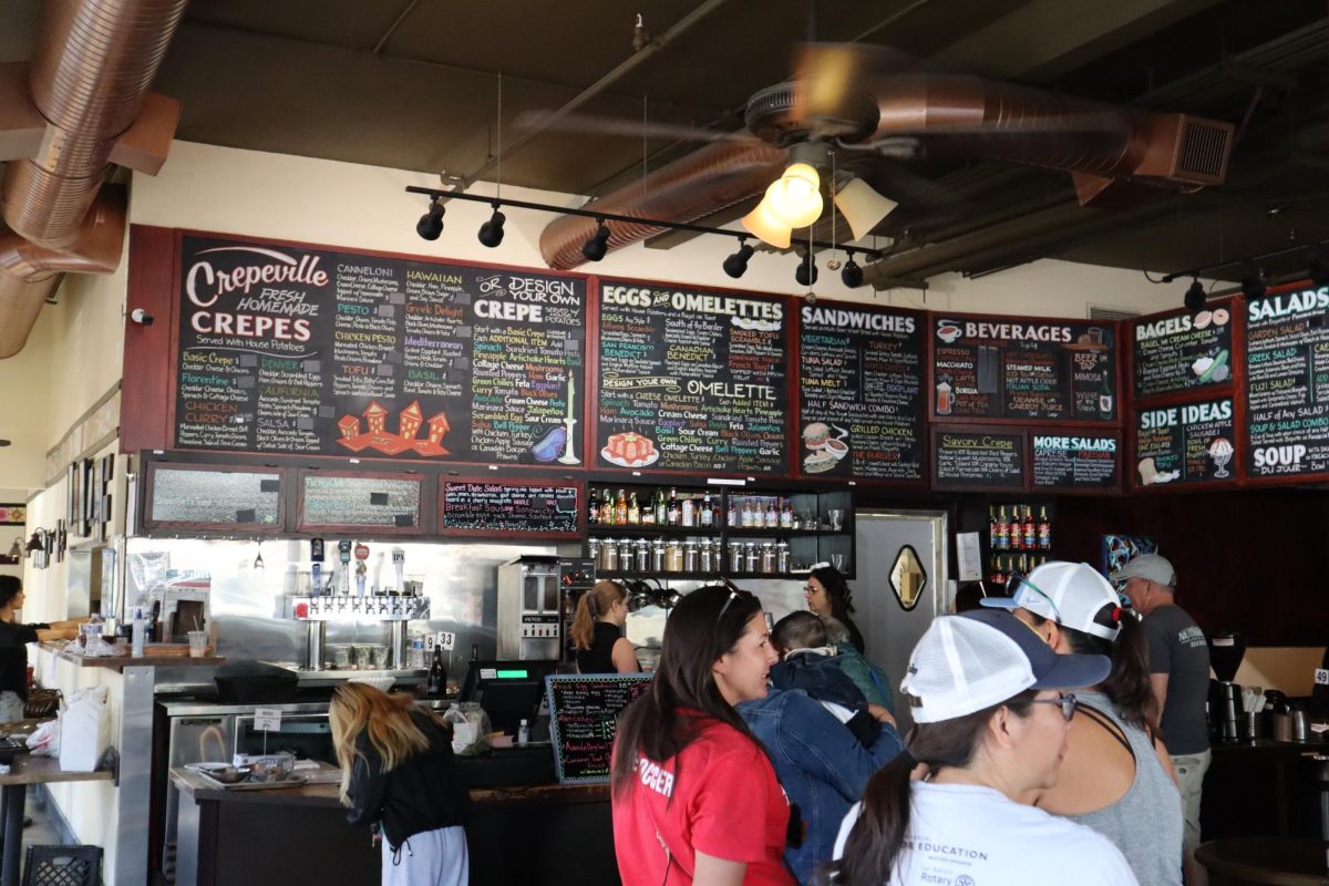 Customers wait in line to order at Crepeville during a Sunday brunch rush on Oct. 20, 2024, in Sacramento, Calif.