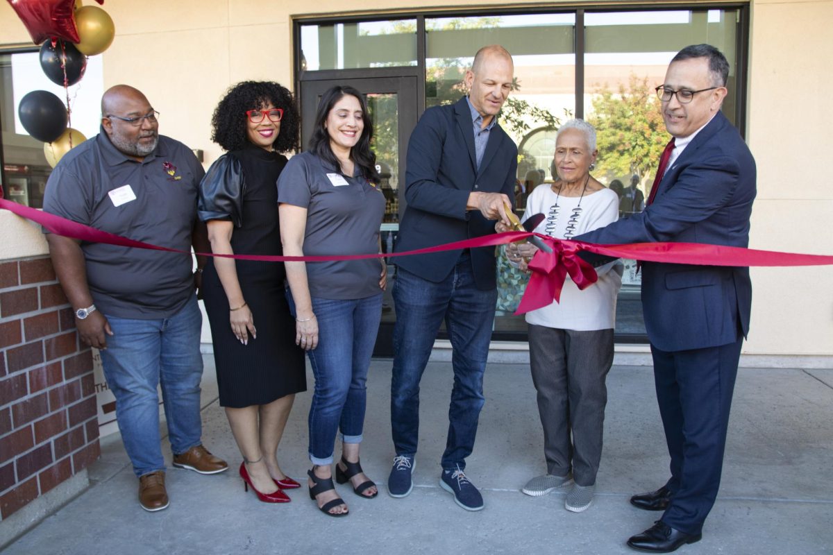 Sacramento City College Dean of Campus Interventions Andre Coleman, Sacramento City College VP of Student Services Davin Brown, Supervisor of Panther Cares Linda Delgadillo, Assemblymember Kevin McCarty, Los Rios Community College District Board of Trustee Pam Haynes and Sacramento City College President Albert Garcia participate in a ribbon cutting ceremony on Oct. 29, 2024, for the grand opening of the new City College Panther Cares facility in Sacramento, Calif.