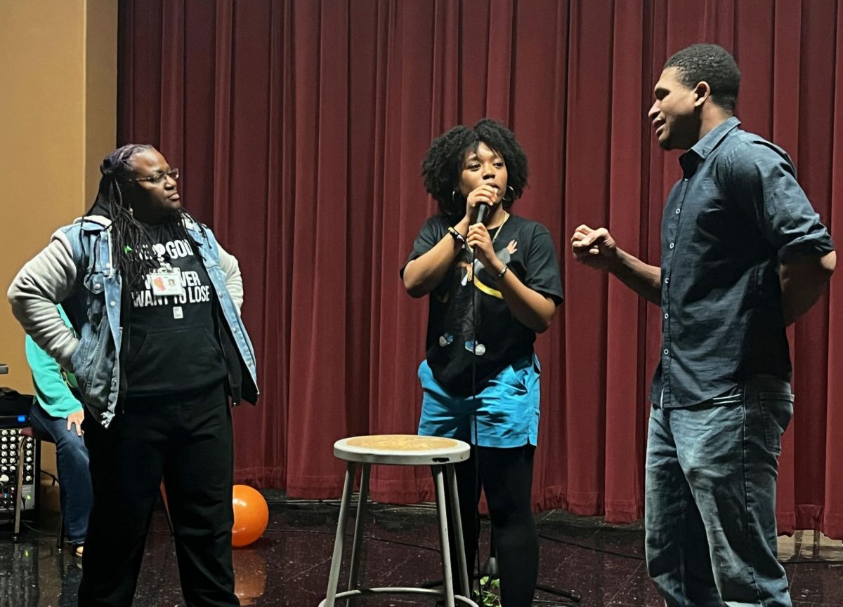 Attendees were invited onstage to play “Finish the Lyrics” game at the Sacramento City College Black Student Union “Ebony Aura Talent Show” on Thursday, Nov. 21, 2024 in Sacramento, Calif.