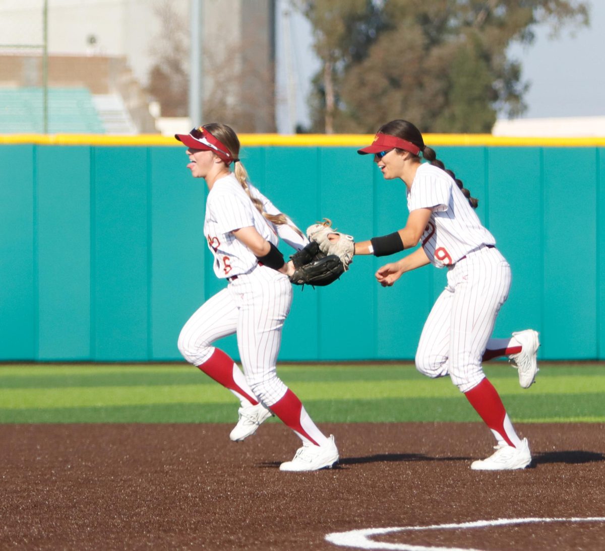 Photo of the day: Panthers softball team in high spirits after doubleheader sweep