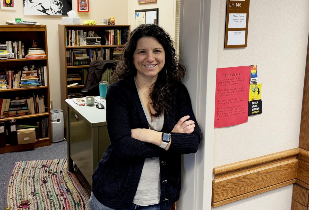 Meghan Facciuto, an instructional assistant at Sacramento City College Writing Center, stands in front of her office, ready to welcome students to the writing journey, Feb. 13, 2025, in Sacramento, Calif.