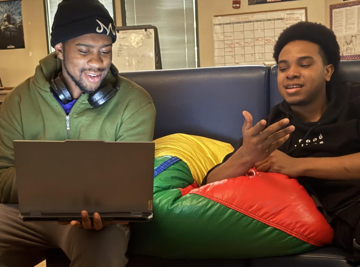 Express reporter Nassir Simms and City of Sacramento Youth, Parks, and Community Enrichment staff Jamal Mack have a good time during their interview at the Oak Park Community Center on Monday, Feb. 24, 2025, in Sacramento, Calif.