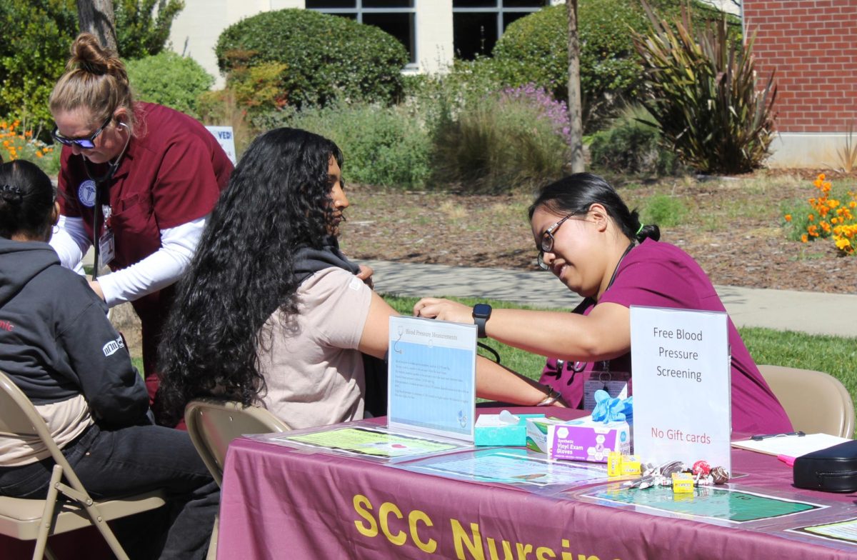 A Sacramento City College medical student takes the blood pressure of a City College student at the blood drive held at Sacramento City College on April 2, 2025, Sacramento, Calif. 