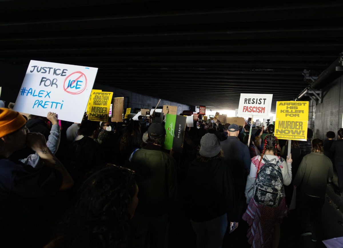 Demonstrators protesting ICE marching through a tunnel on Friday, Jan. 30, 2025, in Sacramento, Calif. 
