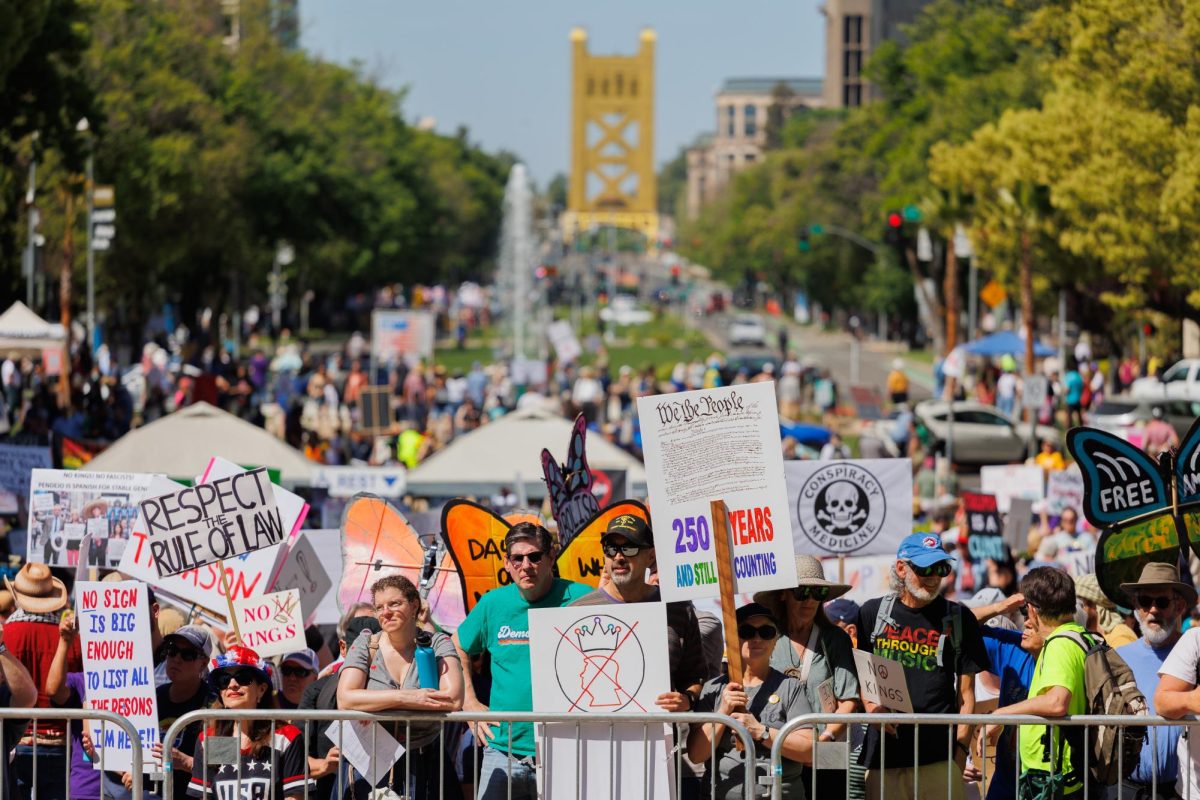 A crowd of demonstrators gather in front of the Capitol Building for the “No Kings” protest on Saturday, March. 28, 2026, in Sacramento, Calif.
