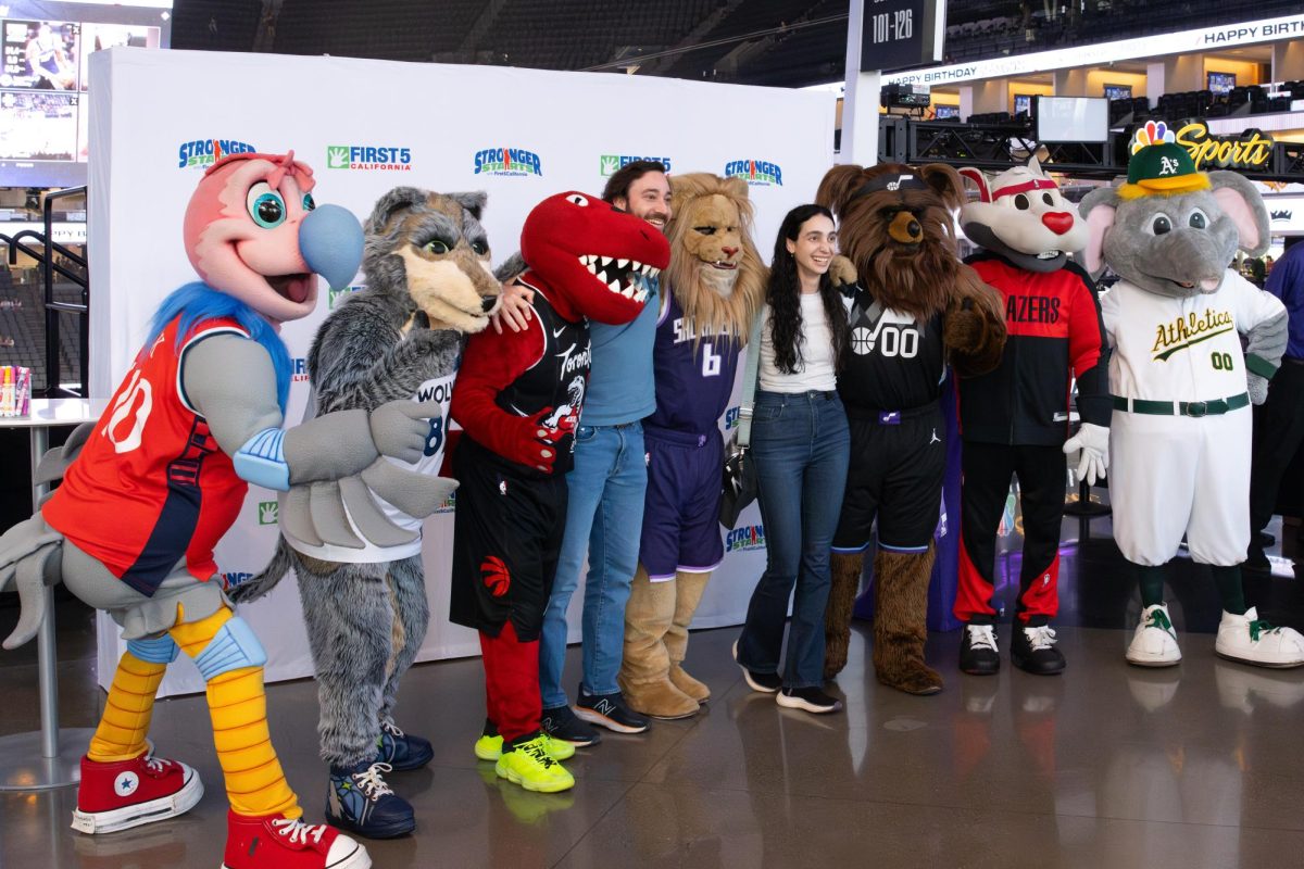 Mascots and fans pose for a photo before a Sacramento Kings home game against the Brooklyn Nets on Sunday, March 22, 2026, in Sacramento, Calif.