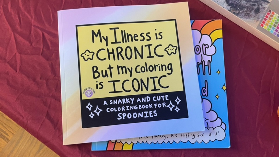 Coloring books, activity books and stickers on the entrance table of the Disability Cultural Center. (Photo courtesy of Rachel Stewart)
